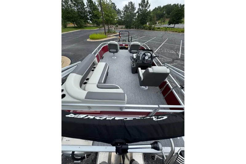 Slide: The Image of 2026 Sun Tracker Bass Buggy 16 XL Select pontoon boat with spacious seating and modern design. - 11