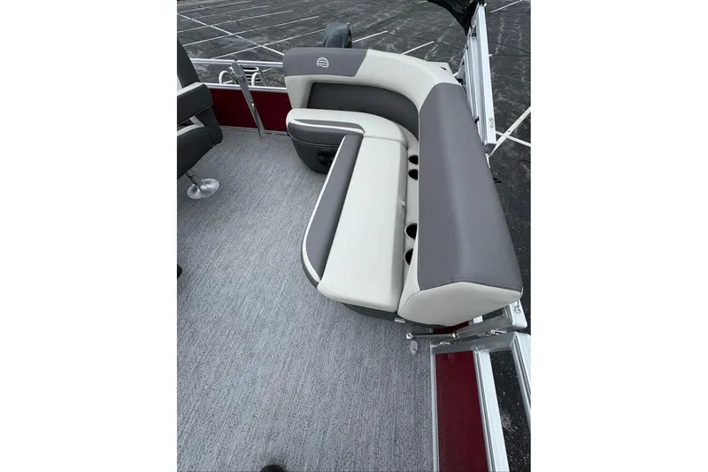 Slide: The Image of 2026 Sun Tracker Bass Buggy 16 XL Select pontoon boat with comfortable seating and cup holders. - 84