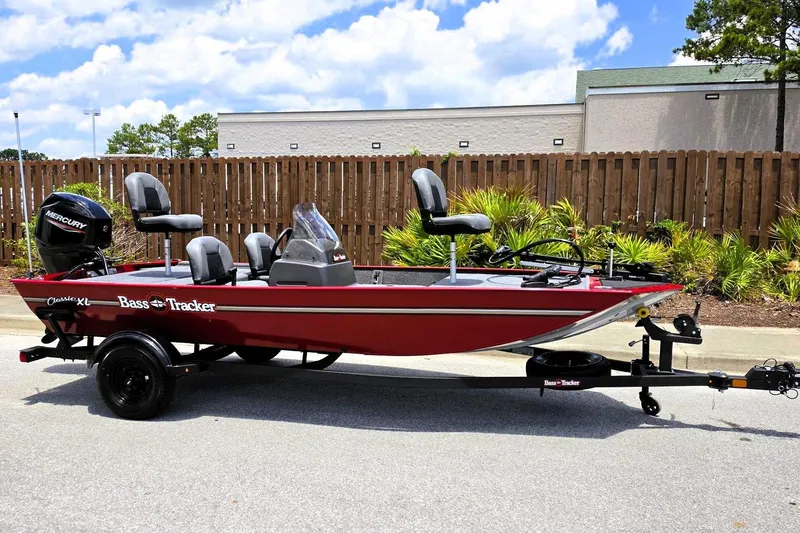 Slide: The Image of 2026 Tracker Bass Tracker Classic XL boat on trailer, parked outdoors. - 3