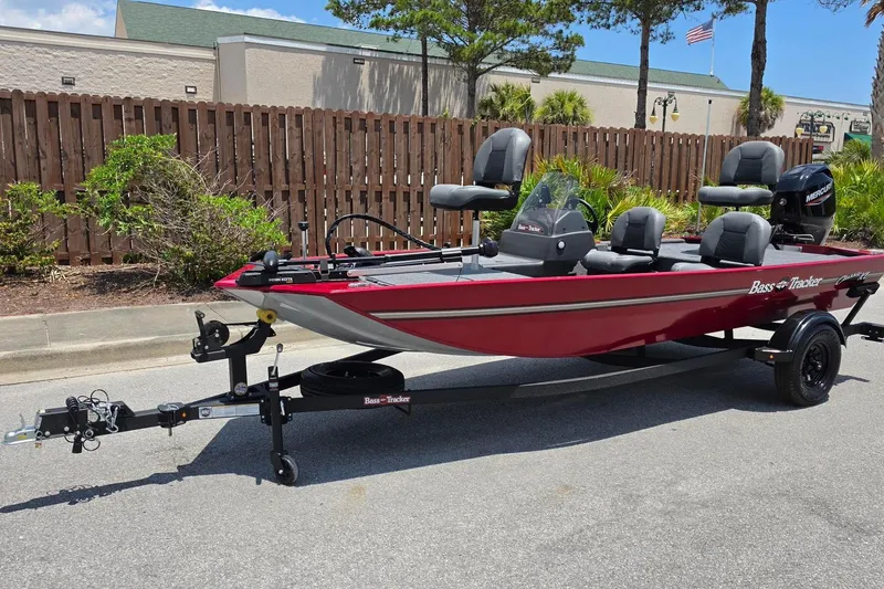 Slide: The Image of 2026 Tracker Bass Tracker Classic XL boat on trailer, parked outdoors. - 7