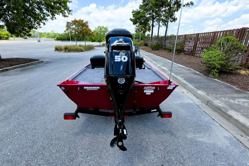 Slide: The Image of 2026 Tracker Bass Tracker Classic XL boat with Mercury 50 engine in parking lot. - 9
