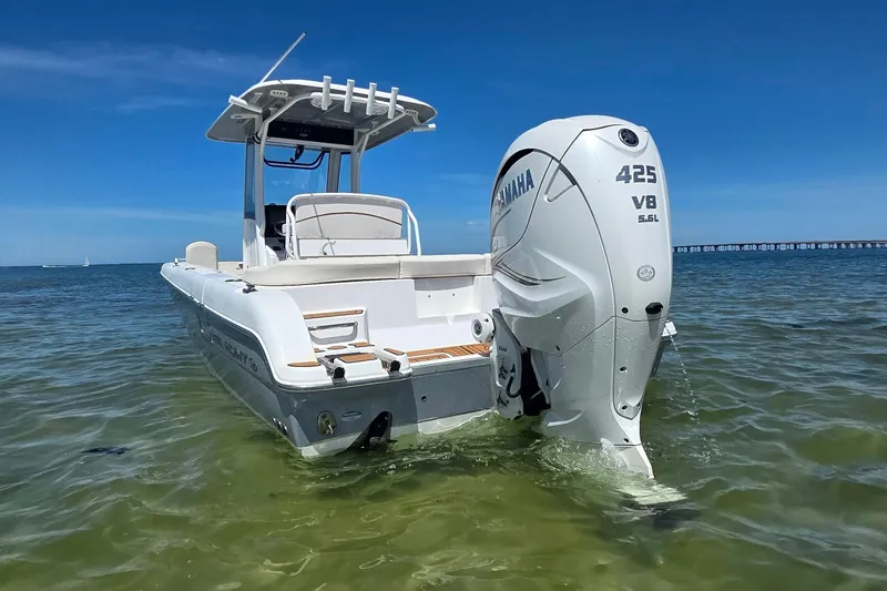 Slide: The Image of 2021 Sea Hunt Escape 27 boat with Yamaha 425 V8 engine in shallow water. - 11