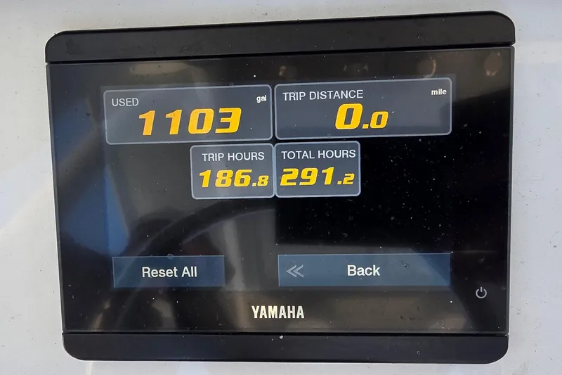 Slide: The Image of Yamaha display showing fuel usage and trip data for 2021 Sea Hunt Escape 27. - 26