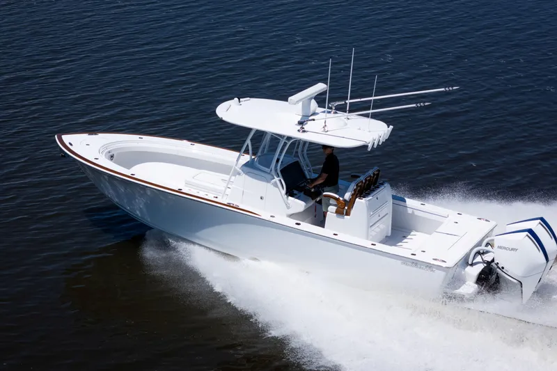 Slide: The Image of 2027 Valhalla Boatworks V-29 Hybrid cruising on water, showcasing sleek design and powerful performance. - 11