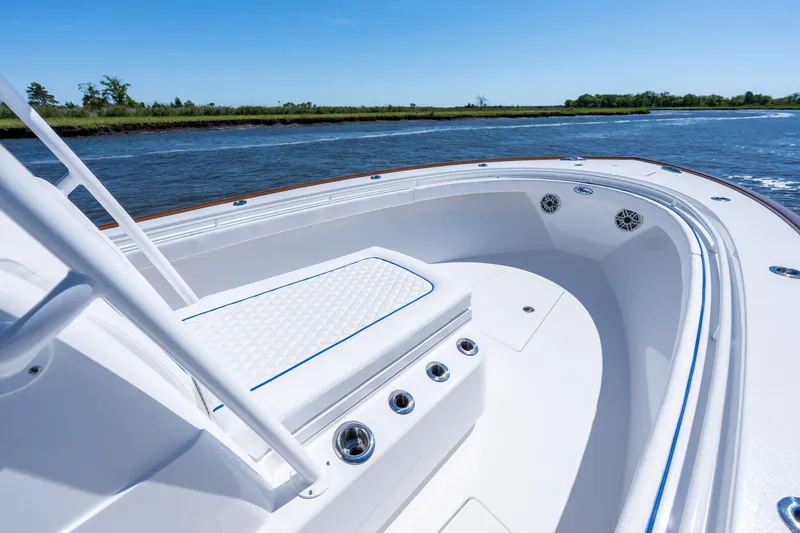 Slide: The Image of 2027 Valhalla Boatworks V-29 Hybrid, sleek white deck, cruising on a sunny day. - 13