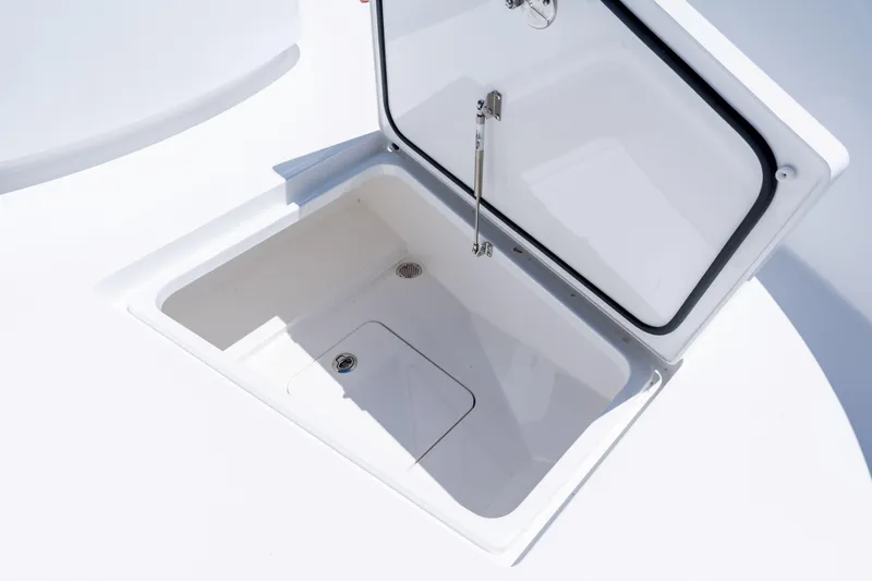 Slide: The Image of Open storage compartment on 2027 Valhalla Boatworks V-29 Hybrid deck. - 15