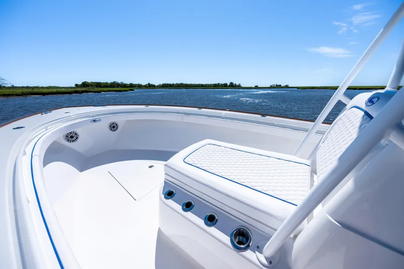 Slide: The Image of 2027 Valhalla Boatworks V-29 Hybrid on water, showcasing sleek design and comfortable seating. - 16