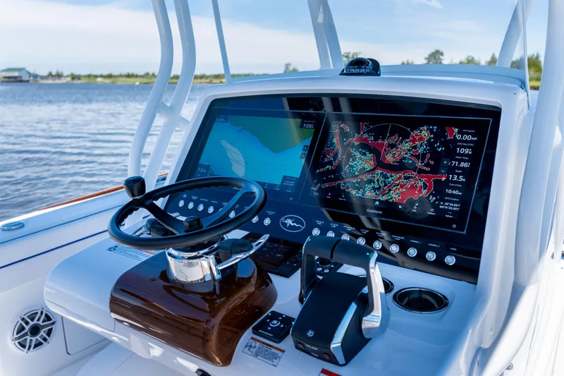 Slide: The Image of 2027 Valhalla Boatworks V-29 Hybrid dashboard with advanced navigation displays. - 29