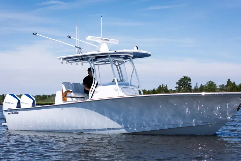Slide: The Image of 2027 Valhalla Boatworks V-29 Hybrid on water, featuring sleek design and dual Mercury engines. - 3