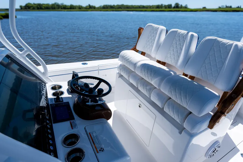Slide: The Image of 2027 Valhalla Boatworks V-29 Hybrid cockpit with luxurious seating and advanced controls. - 31