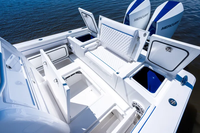 Slide: The Image of 2027 Valhalla Boatworks V-29 Hybrid with open storage compartments and Mercury engines. - 37