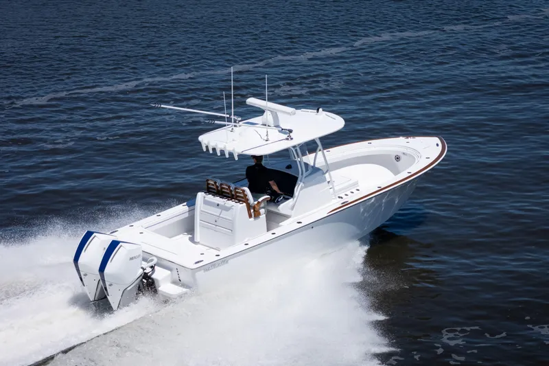 Slide: The Image of 2027 Valhalla Boatworks V-29 Hybrid cruising on open water, showcasing sleek design and performance. - 7