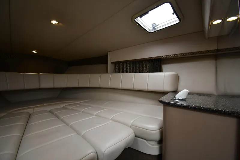 Slide: The Image of Interior of 2004 Formula 330 Sun Sport boat with plush seating and modern design. - 27