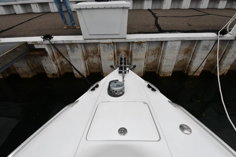Slide: The Image of Bow of a 2004 Formula 330 Sun Sport boat docked at a marina. - 4