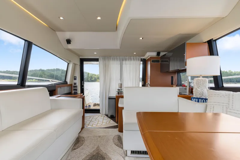 Slide: The Image of Luxurious interior of a 2017 Prestige 500 yacht with elegant furnishings and scenic views. - 15