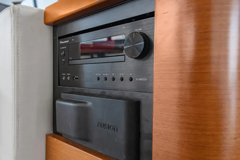 Slide: The Image of Audio system in a 2017 Prestige 500 yacht, featuring Pioneer and Fusion components. - 17