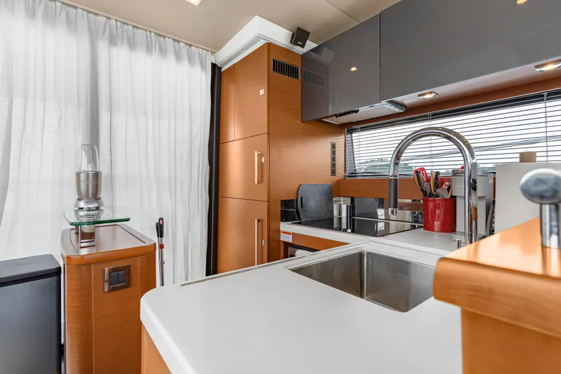 Slide: The Image of Modern kitchen interior of 2017 Prestige 500 yacht with sleek design and stainless steel fixtures. - 20