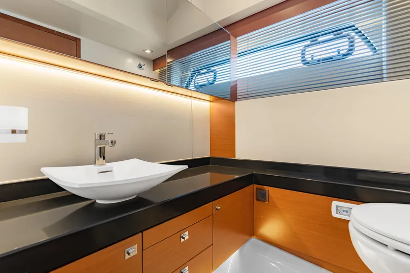 Slide: The Image of Luxurious bathroom interior on a 2017 Prestige 500 yacht, featuring modern sink and sleek design. - 22