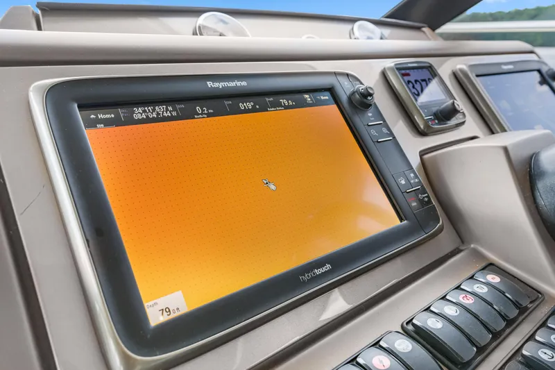 Slide: The Image of Control panel of a 2017 Prestige 500 yacht with Raymarine navigation display. - 42