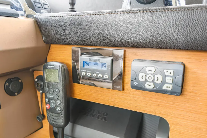 Slide: The Image of Control panel of a 2017 Prestige 500 yacht with electronic devices and displays. - 45