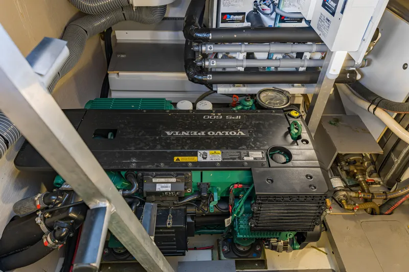 Slide: The Image of Engine room of a 2017 Prestige 500 yacht featuring a Volvo Penta IPS 600 engine. - 54