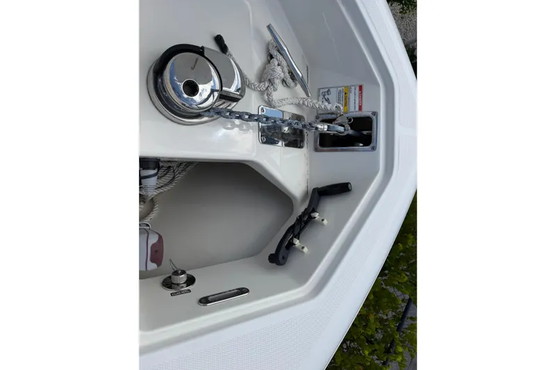Slide: The Image of 2019 Boston Whaler 280 Outrage anchor system with winch and rope storage. - 39