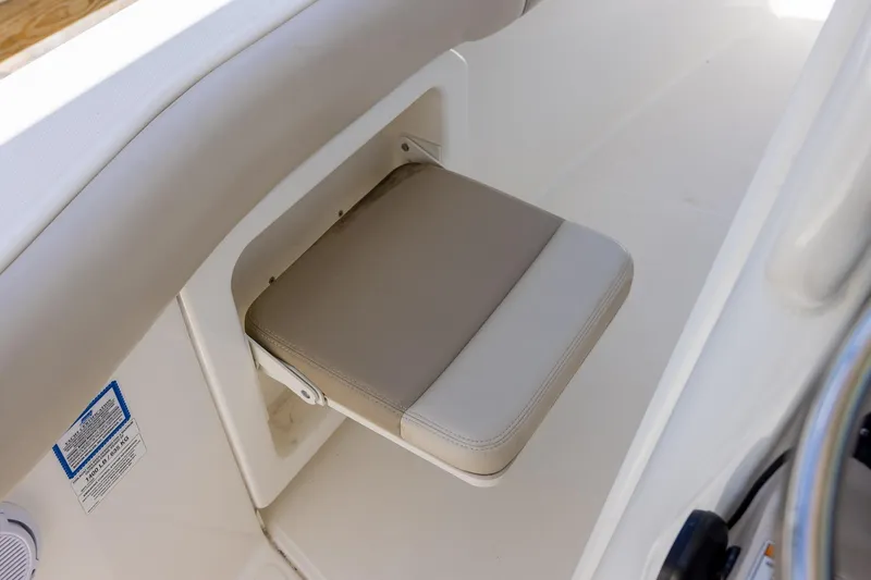 Slide: The Image of Foldable seat on 2019 Boston Whaler 280 Outrage boat interior. - 22