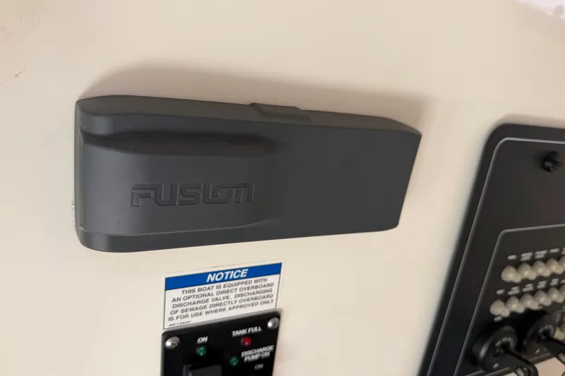 Slide: The Image of Fusion audio system on 2019 Boston Whaler 280 Outrage boat dashboard. - 52