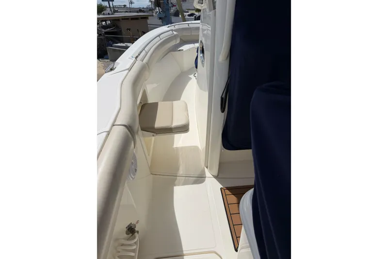 Slide: The Image of 2019 Boston Whaler 280 Outrage interior with cushioned seating and sleek design. - 54