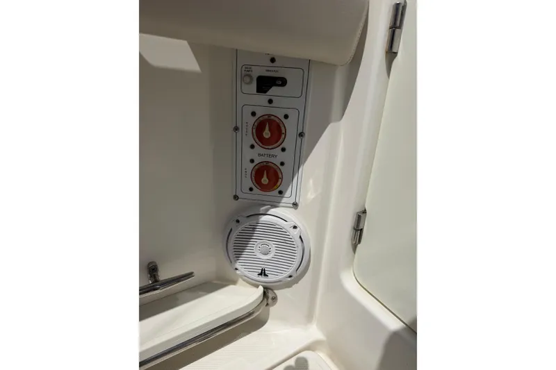 Slide: The Image of Control panel and speaker on a 2019 Boston Whaler 280 Outrage boat. - 6