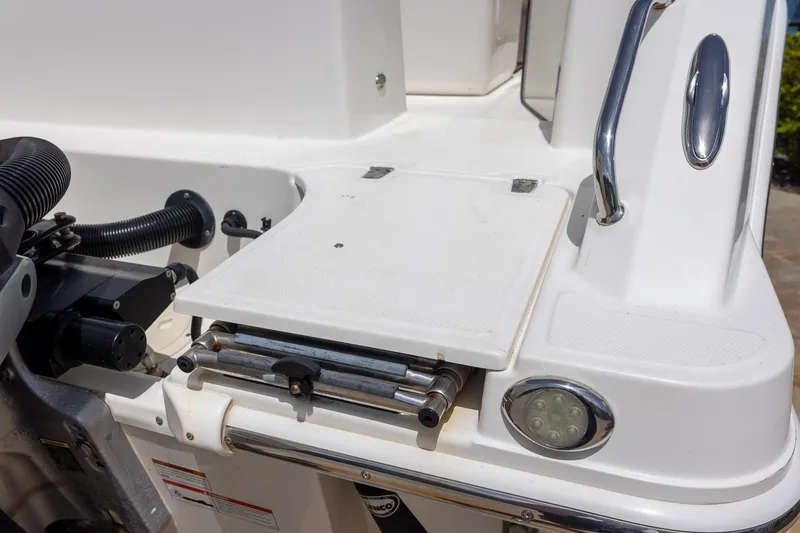 Slide: The Image of 2019 Boston Whaler 280 Outrage boat detail, featuring deck and hardware components. - 42