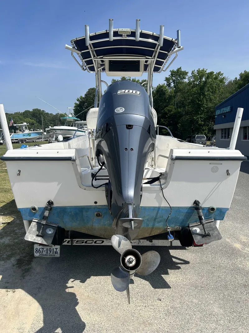 Slide: The Image of 2005 Sea Hunt Triton 202 boat with outboard motor. - 2