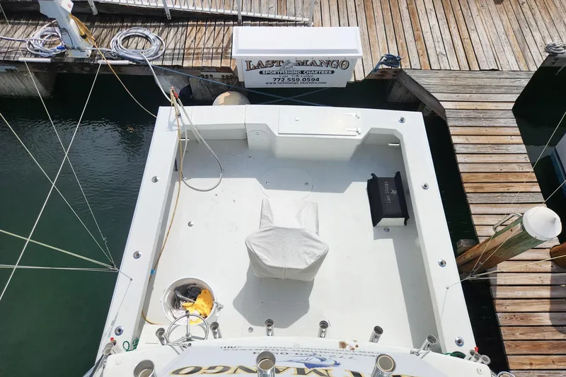 Slide: The Image of Aerial view of 1987 Young Brothers Custom Sport Fish boat docked at marina. - 29