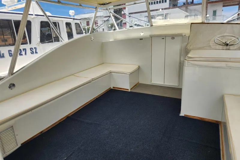 Slide: The Image of Interior of 1987 Young Brothers Custom Sport Fish boat with seating and storage. - 6