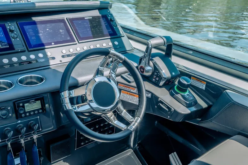 Slide: The Image of Cockpit of 2027 Monterey 385SS Super Sport with advanced navigation controls and displays. - 23