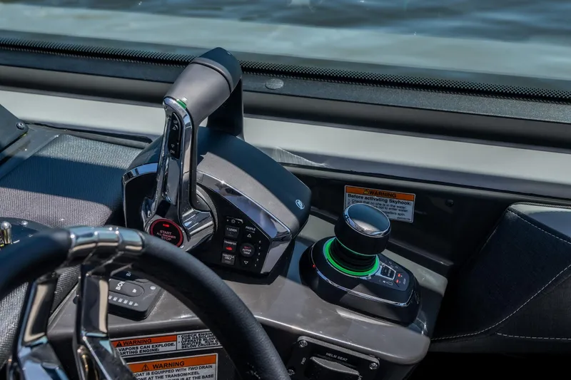 Slide: The Image of Control panel of 2027 Monterey 385SS Super Sport boat with joystick and throttle. - 29