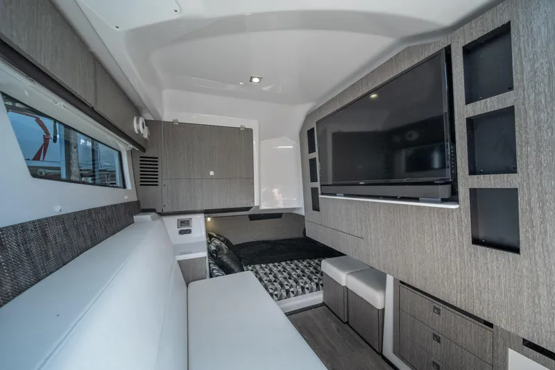 Slide: The Image of Luxurious interior of a 2027 Monterey 385SS Super Sport boat with modern amenities. - 36