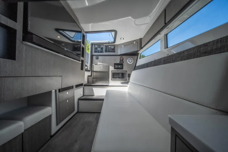 Slide: The Image of Interior of 2027 Monterey 385SS Super Sport boat, featuring modern seating and sleek design. - 38