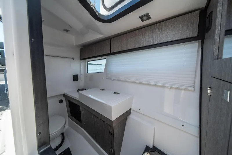 Slide: The Image of Interior of 2027 Monterey 385SS Super Sport boat bathroom with modern fixtures. - 41