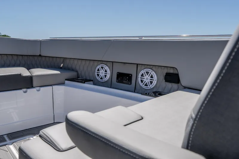 Slide: The Image of Interior of 2027 Monterey 385SS Super Sport boat with luxurious seating and speakers. - 43