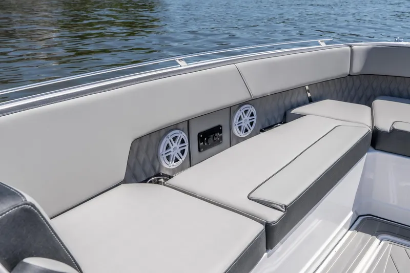 Slide: The Image of Luxurious seating on the 2027 Monterey 385SS Super Sport boat, featuring sleek design and speakers. - 44