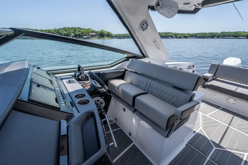 Slide: The Image of Interior of 2027 Monterey 385SS Super Sport boat with sleek seating and modern dashboard. - 50