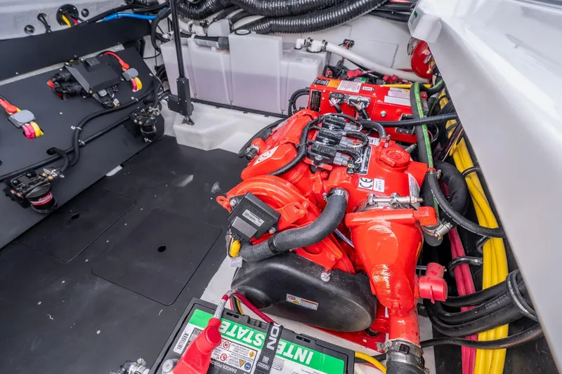 Slide: The Image of Engine compartment of 2027 Monterey 385SS Super Sport with vibrant red components and wiring. - 54