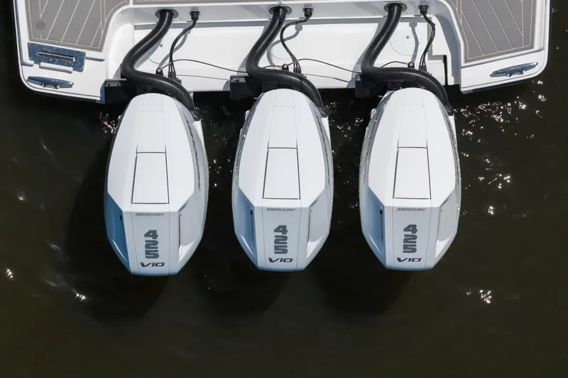 Slide: The Image of Triple Mercury 425 V10 engines on a 2027 Monterey 385SS Super Sport boat. - 9