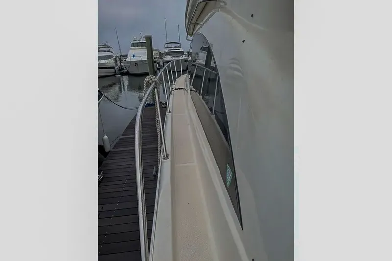 Slide: The Image of 2004 Meridian 411 Sedan docked, side view. - 10
