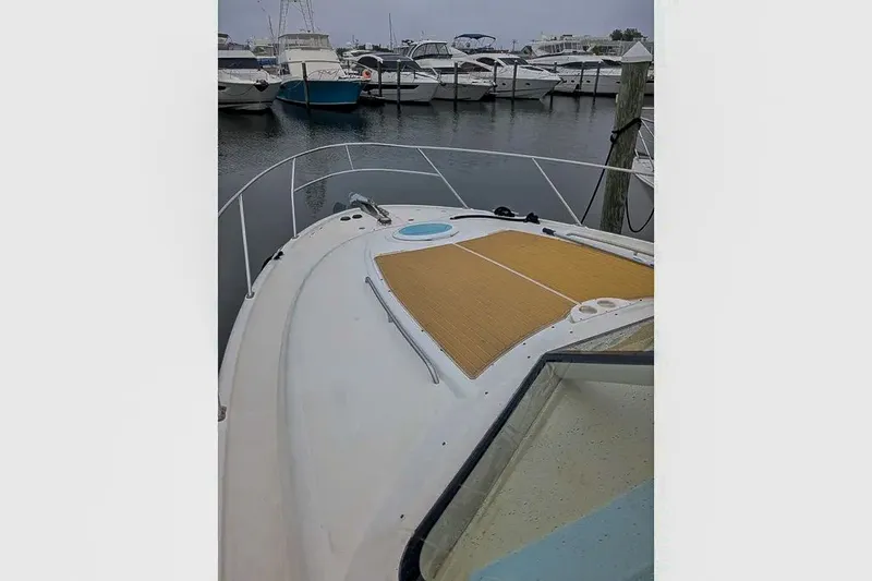 Slide: The Image of 2004 Meridian 411 Sedan in harbor, front deck view. - 11