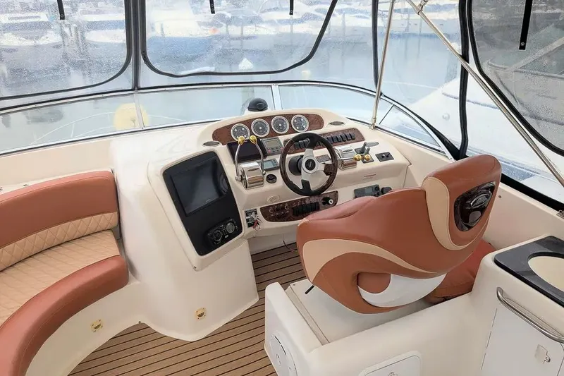 Slide: The Image of Interior of a 2004 Meridian 411 Sedan yacht with helm station. - 13