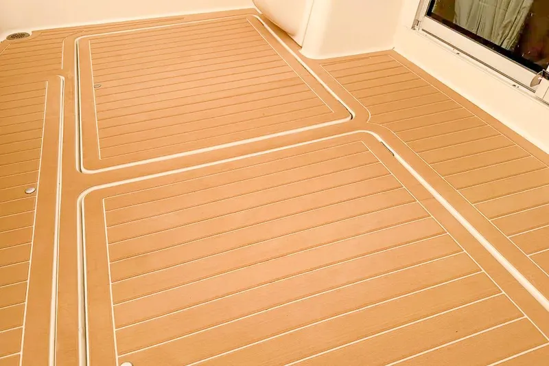 Slide: The Image of Teak deck of a 2004 Meridian 411 Sedan boat. - 8