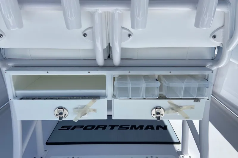 Slide: The Image of Storage compartments on a 2026 Sportsman Heritage 231 Center Console boat. - 11