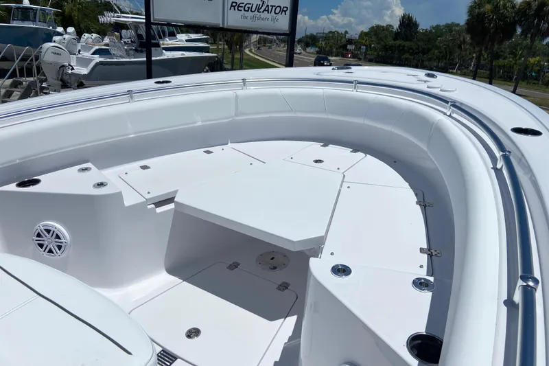 Slide: The Image of 2026 Sportsman Heritage 231 Center Console boat with spacious seating and sleek design. - 30